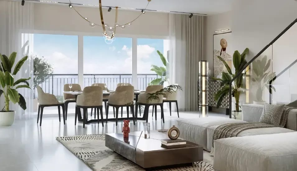A living and dining room opening onto a balcony, artist's impression